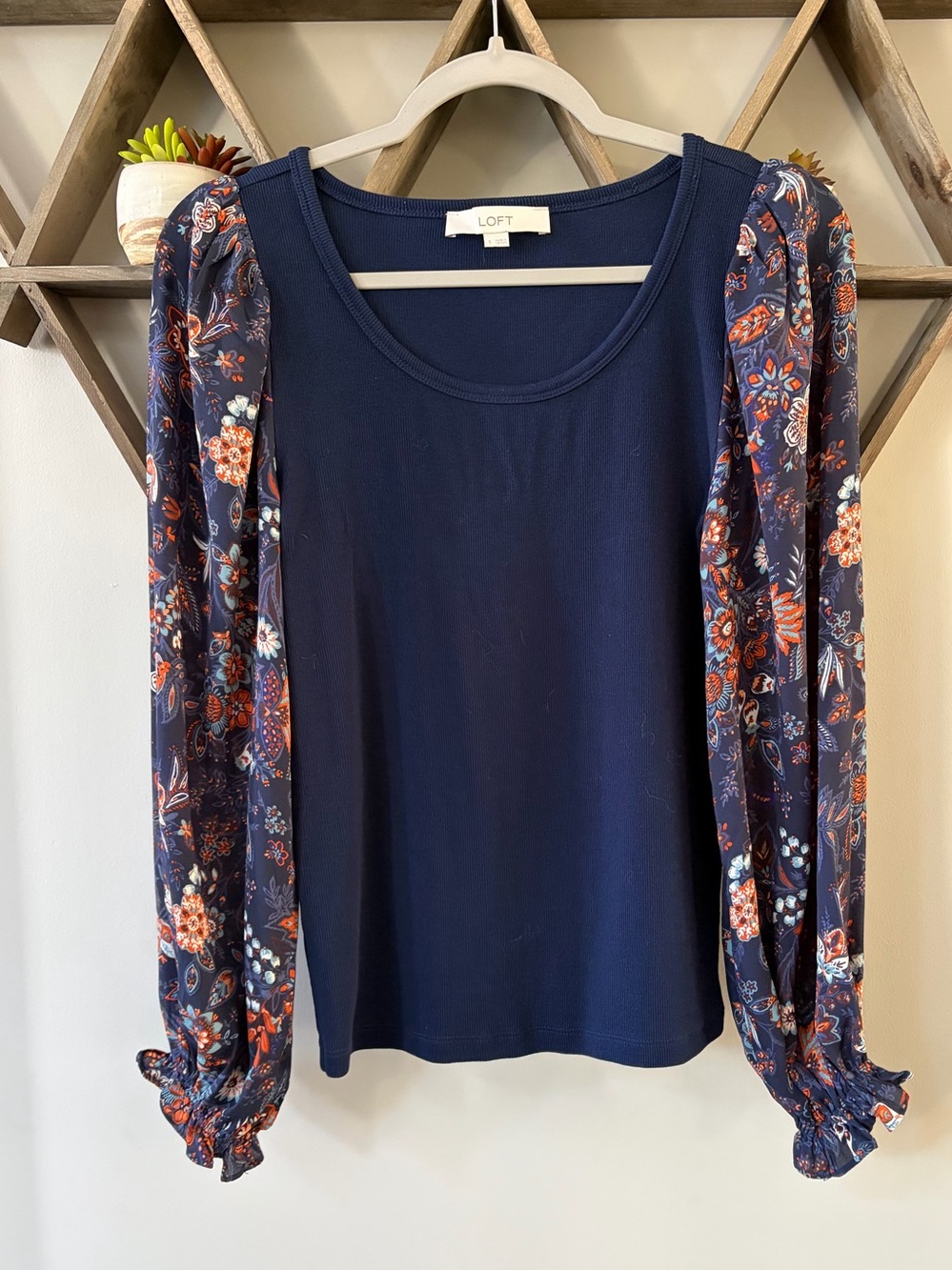 Loft cotton blend floral sleeve mixed media top. Navy. Size small.